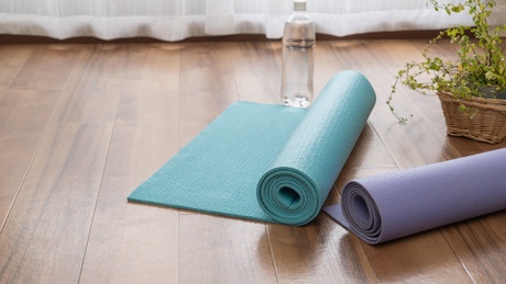 Yoga mats on wooden floor