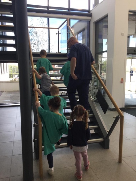 Going up the stairs with Dr Malcolm Stewart