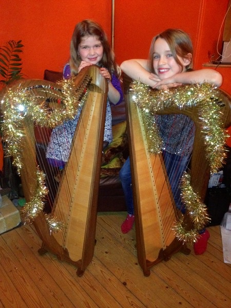 Photo of girls playing harp