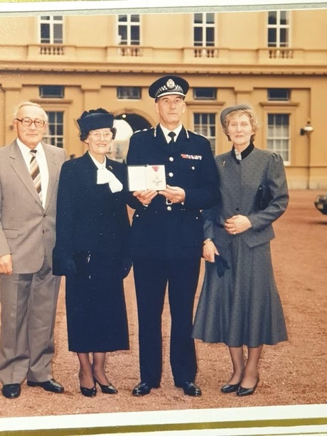 Alistair Lynn on the day he was presented with the CVO with wife Chrissie on his right and his sister and brother-in-law