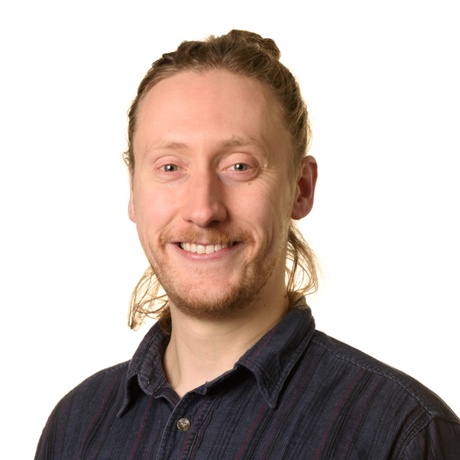 Formal headshot photo of Jonathan Lock on a white background
