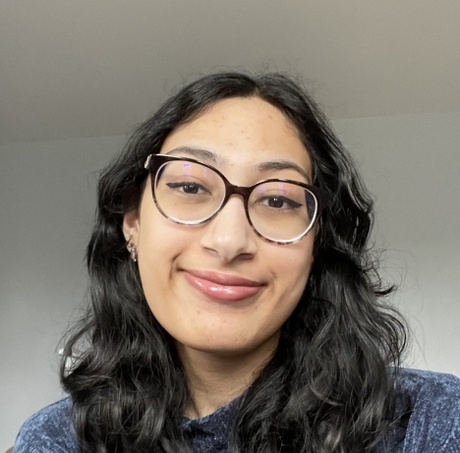 Picture of Nabeeha sitting in a room.