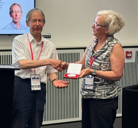 Professor Graeme Murray receiving his Ritchie Medal