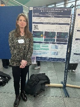 Virtu with her poster