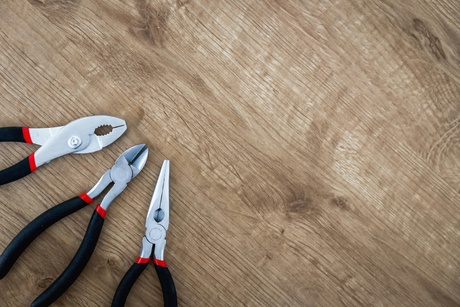 an image of some pliers to indicate some manual work in our libraries