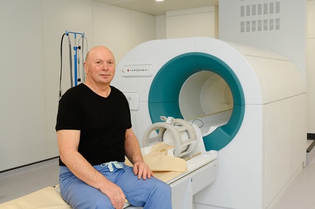 Volunteer getting ready to go in the FCI scanner as part of study