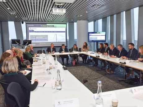 Attendees listening to discussions