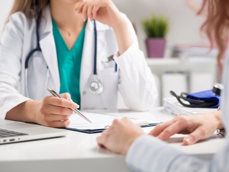 A medical practitioner and a patient