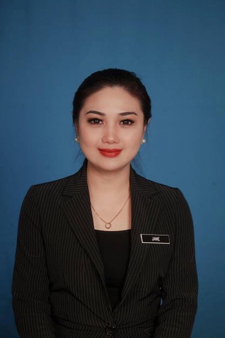 Headshot of Jane smiling