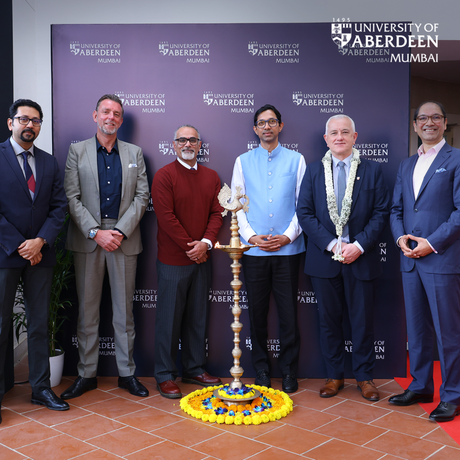 Six people at a corporate announcement event