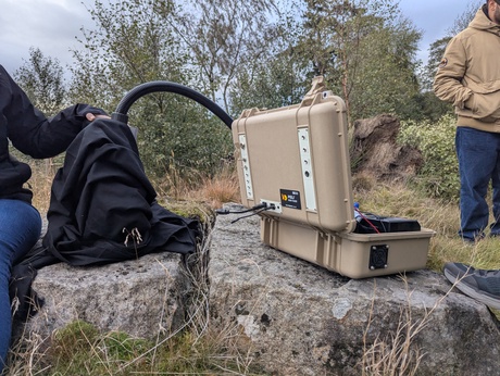 The portable spectrometer (built by the teams to train astronauts) being tested in locations in Scotland that resemble the lunar surface. Credit: University of Leicester