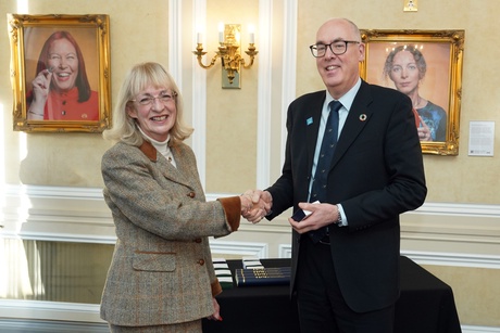 Marcel receiving his award from Professor Anne Anderson