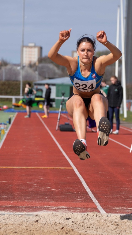 an athlete doing the long jump