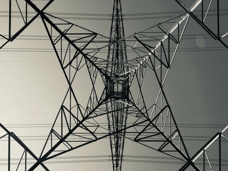 An electricity pylon viewed from below