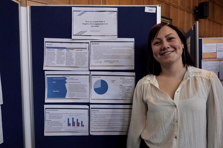 Jannica presenting her poster during the session.