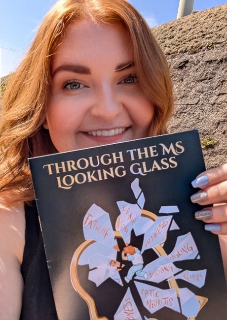 Claire Robertson with a copy of her book