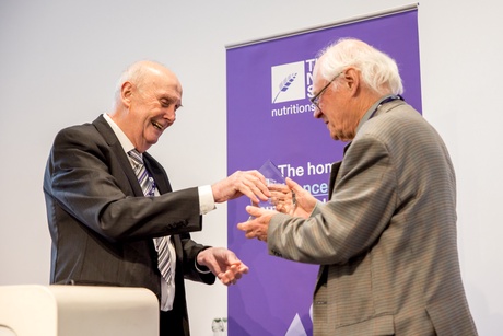 Prof Harry Flint receiving the Gowland Hopkins Award at the Nutrition Society Winter Conference 2026 from Honorary Officer, Professor Andy Salter (photo by Richard Murgatroyd Photography)