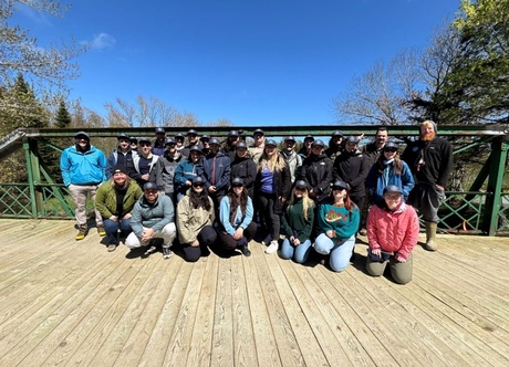 Lauren and others who attended the NoWPaS workshop stood on a bridge