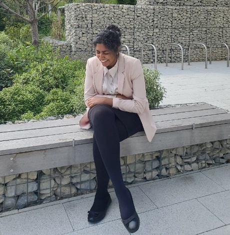 Elizabeth sat outside on University campus