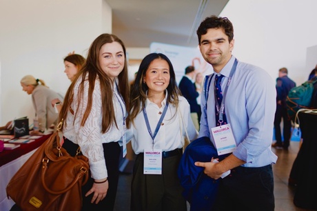 Raeleen stood with two others who attended the congress