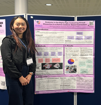 Tessa stood next to her project poster