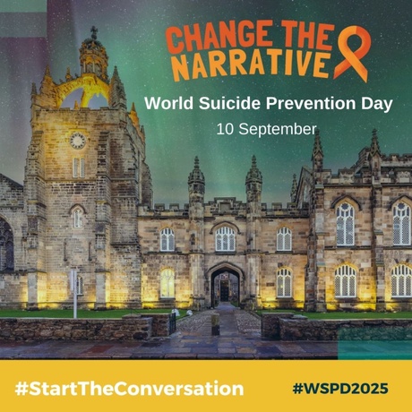 Kings college lit up in yellow and the words change the narrative world suicide prevention day 10 September