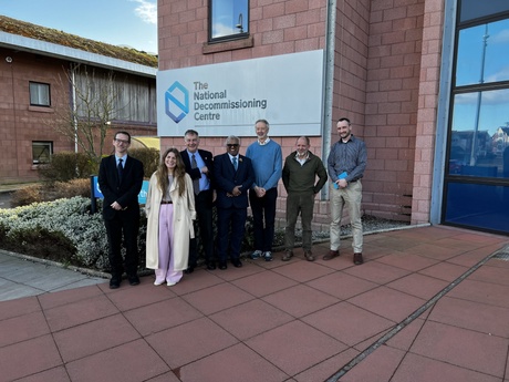 A group standing outside the NDC
