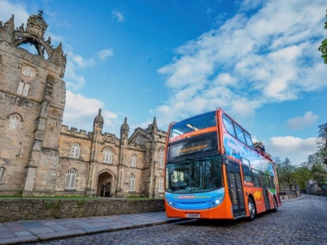 An Aberdeen open-top tour bus outside King's College Chapel