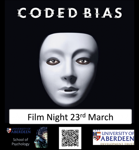 Black background with an image of a white facemask