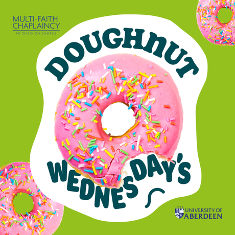 An image of a pink doughnut with sprinkles on a green and white background