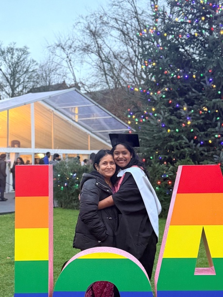 Angara Gowthami hugging a family member after their graduation ceremony