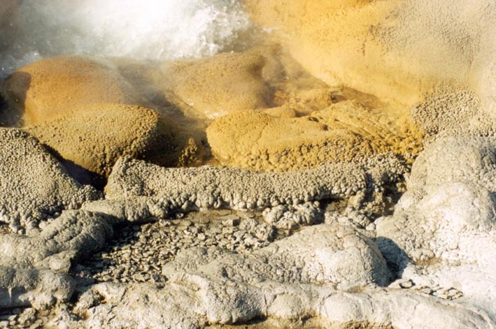 Splash textures seen around a modern geyser vent.