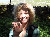 Student holding a vole