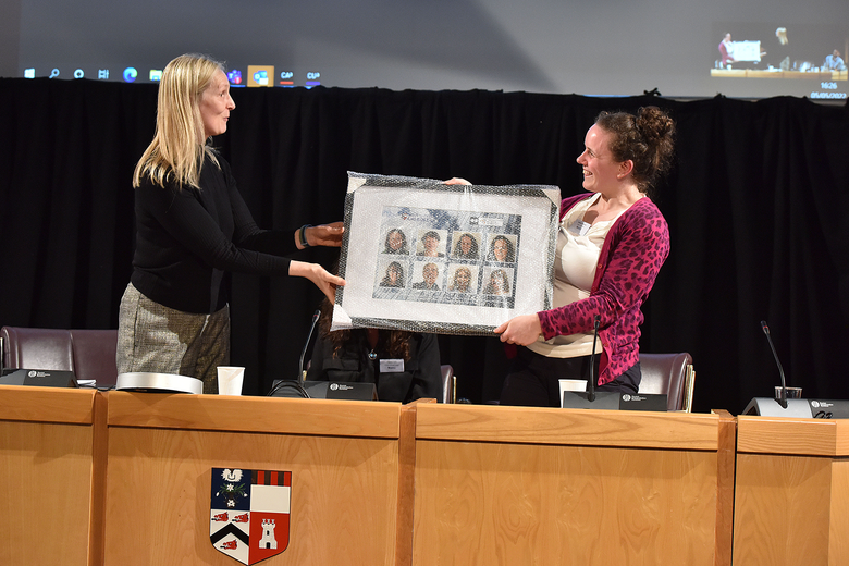 Professor Ruth Taylor handing over prize to Dr Stephanie Thomson