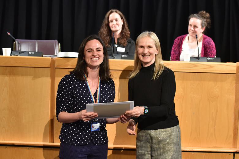 Dr Cara Bezzina receiving the Best Judged poster certificate from Professor Ruth Taylor