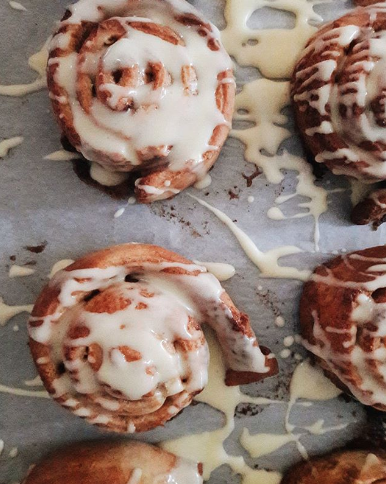 Cinnamon rolls drizzled in white icing