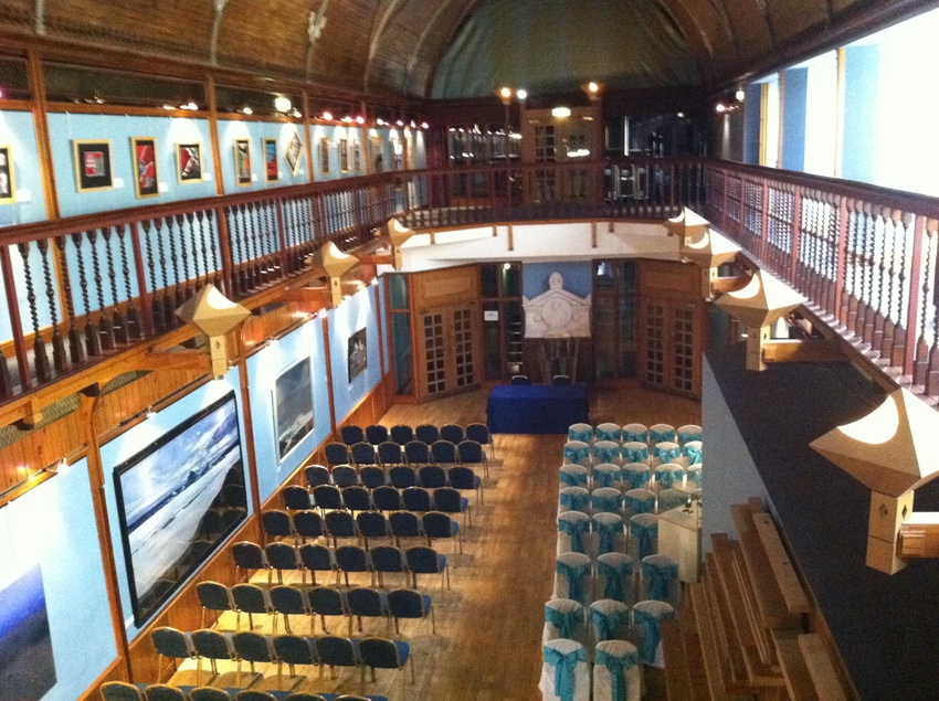 Ceremony set up showing chairs covered and uncovered.