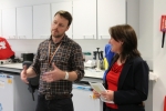 George Mcilroy showing Maree Todd a lab