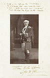 Publicity image of James Scott Skinner in full Highland Dress, holding fiddle