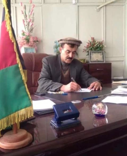 Ahmad's father at work before the collapse of the Afghan government