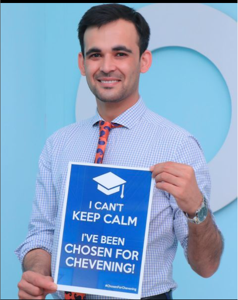 Receiving his Chevening Scholarship