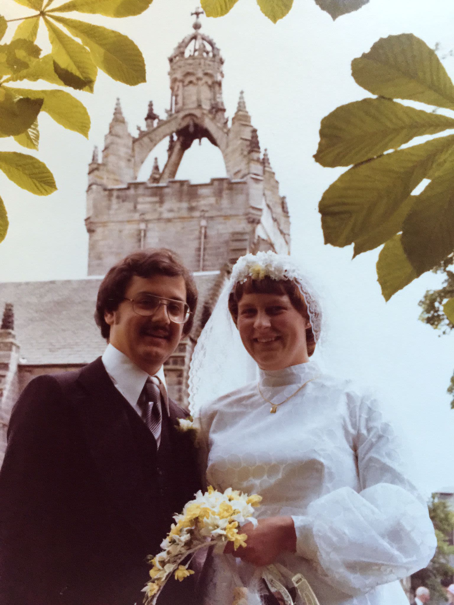 Liz and Brian standing in front of King's College Chapel in 1977