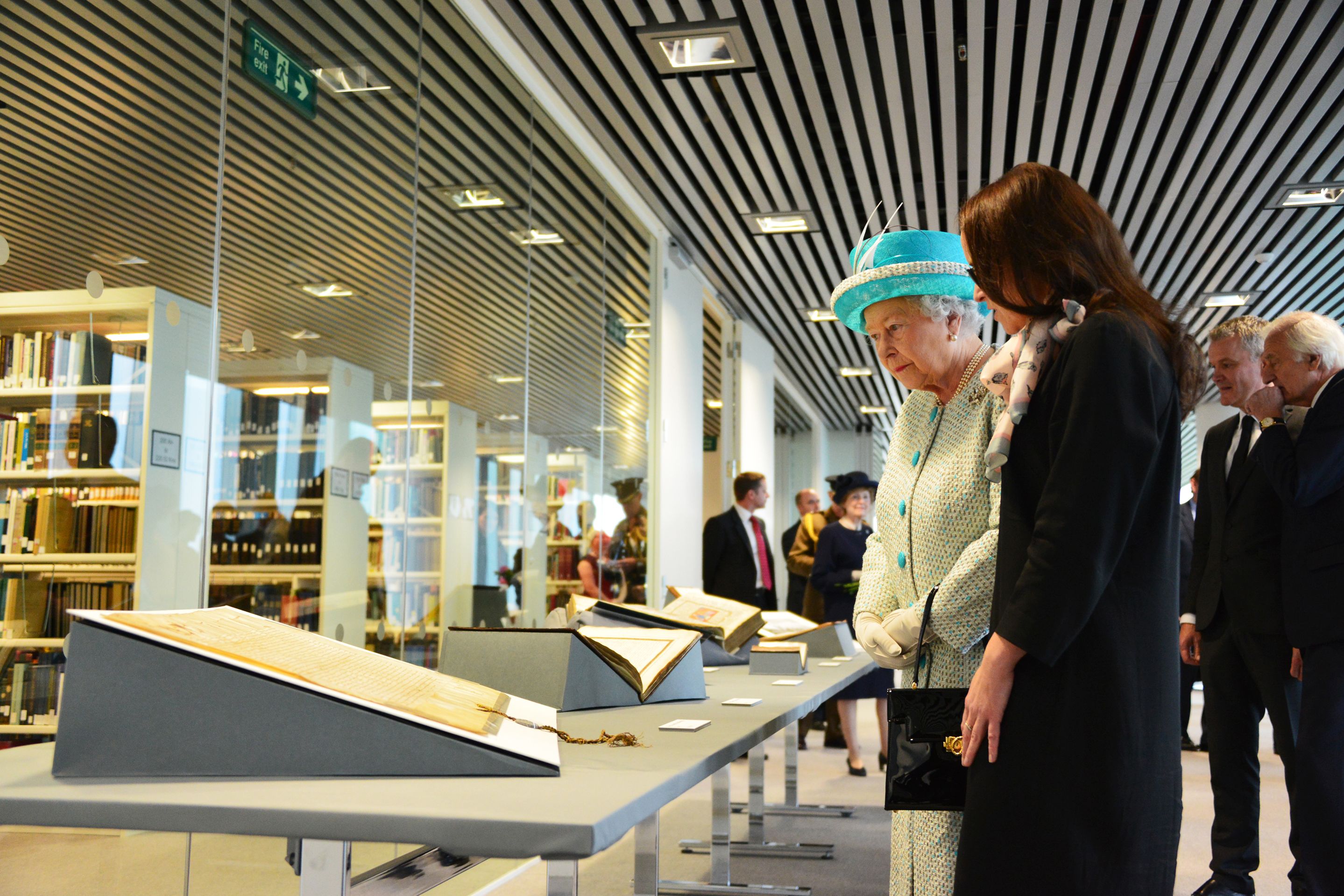 Her Majesty is shown the Aberdeen bestiary during the opening of the Sir Duncan Rice Library in 2012