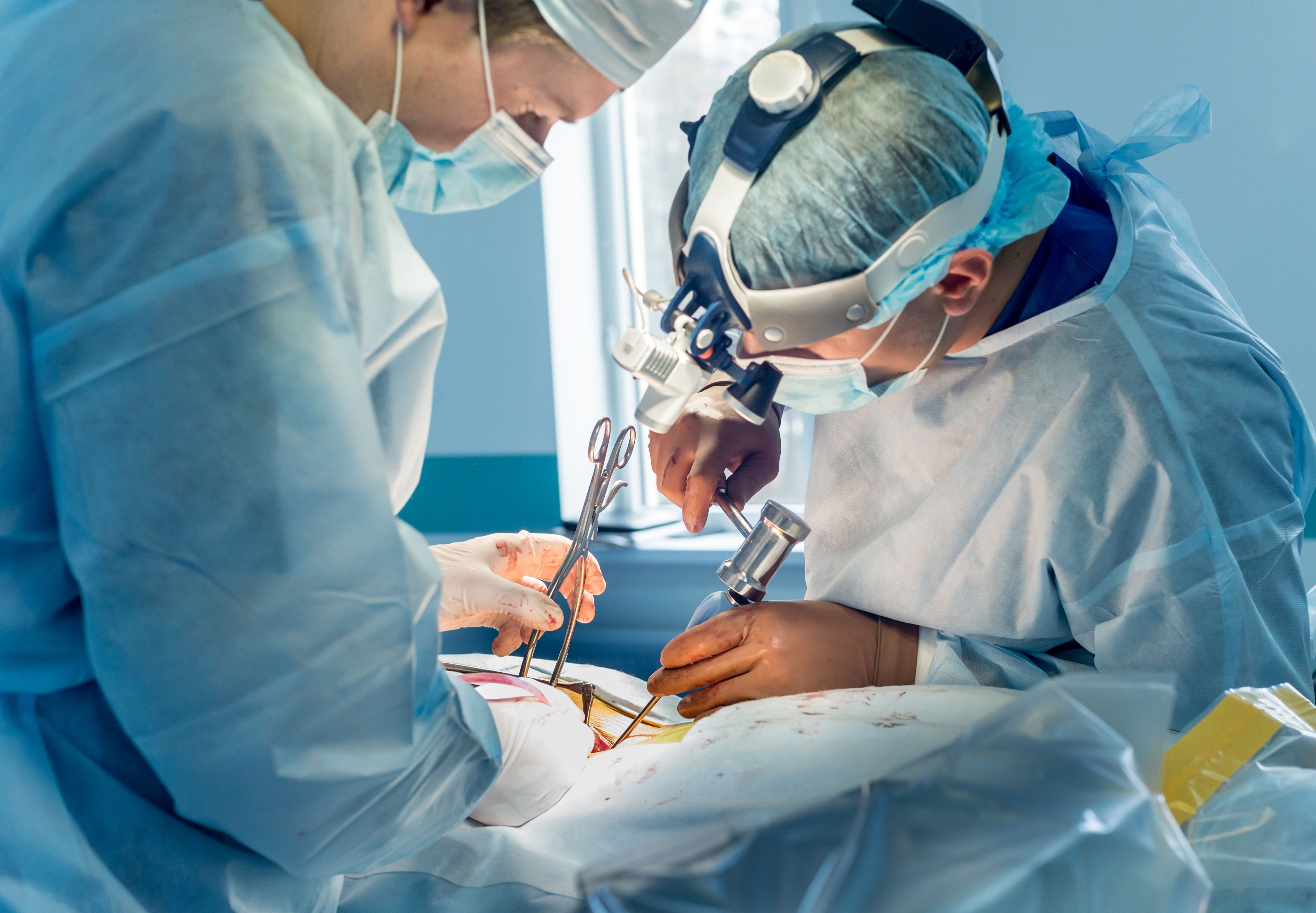 Surgeons performing operation