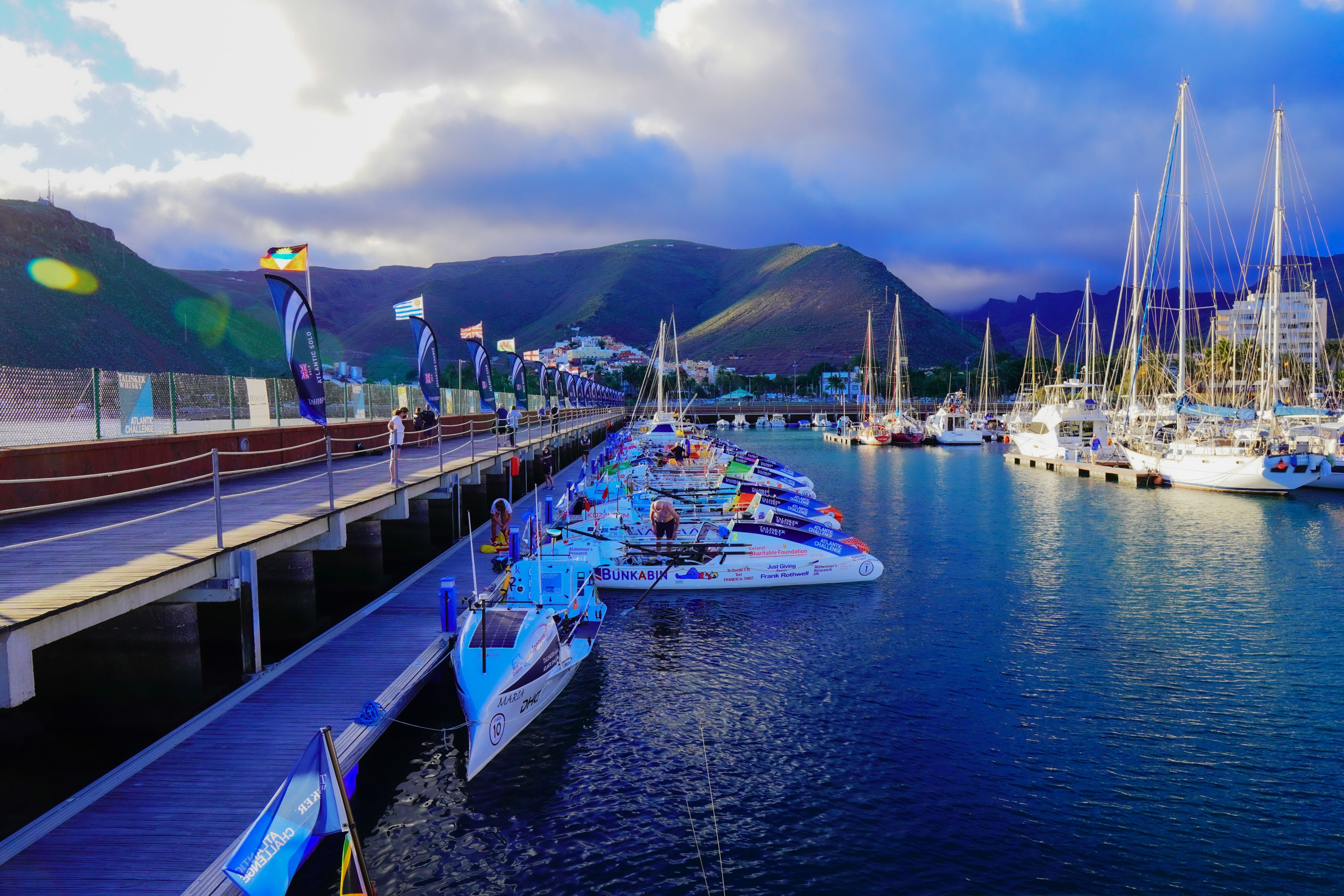 Boats anchored in a marina.
