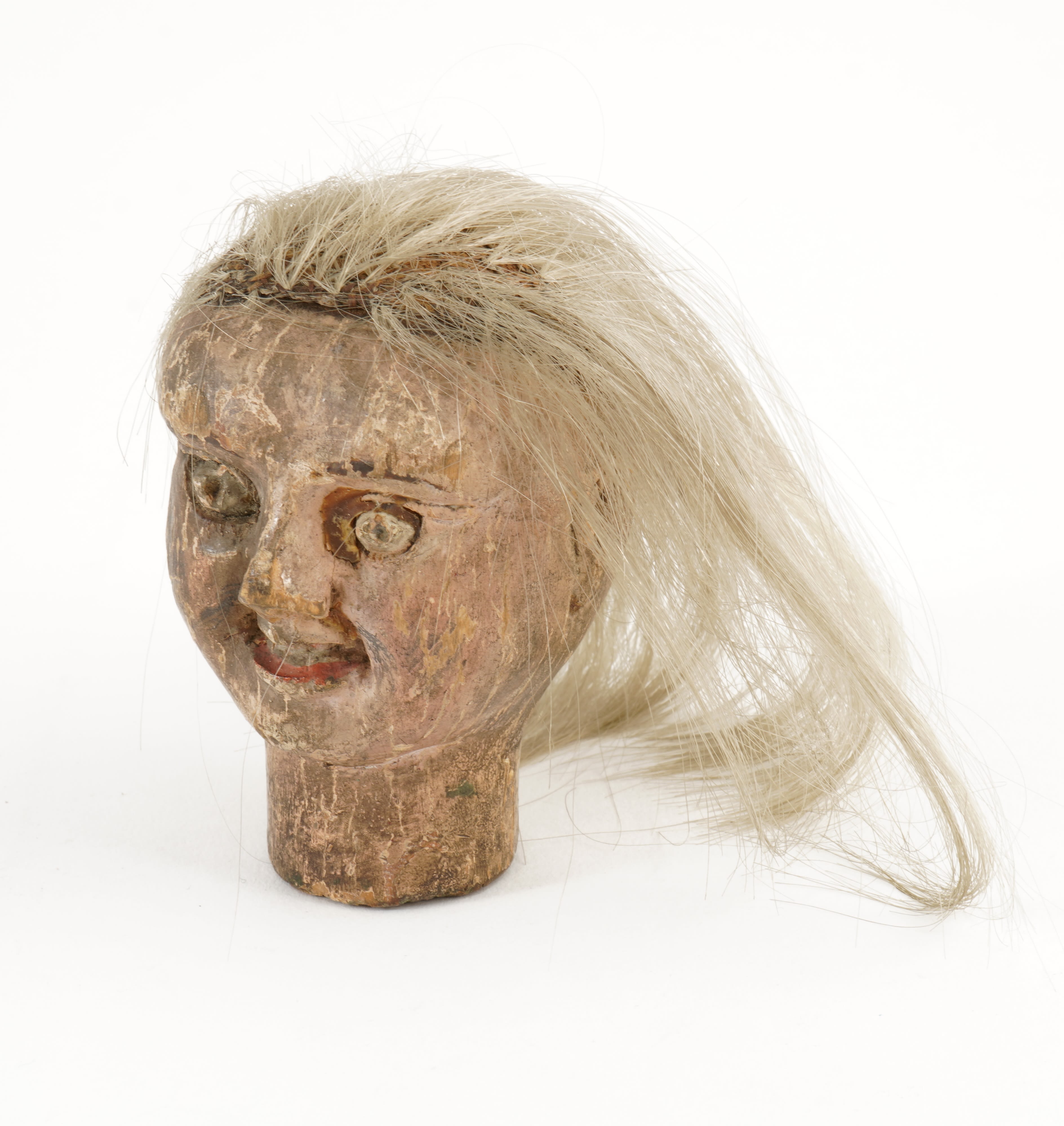 Copland invented his ‘head of despair’ to demonstrate the phenomenon of static electricity. The hair is woven into a tinfoil scalp, connected to the base of the head by a metal rod. When placed on an electro-statically charged table, the hair stands on end creating an expression of shock and despair.