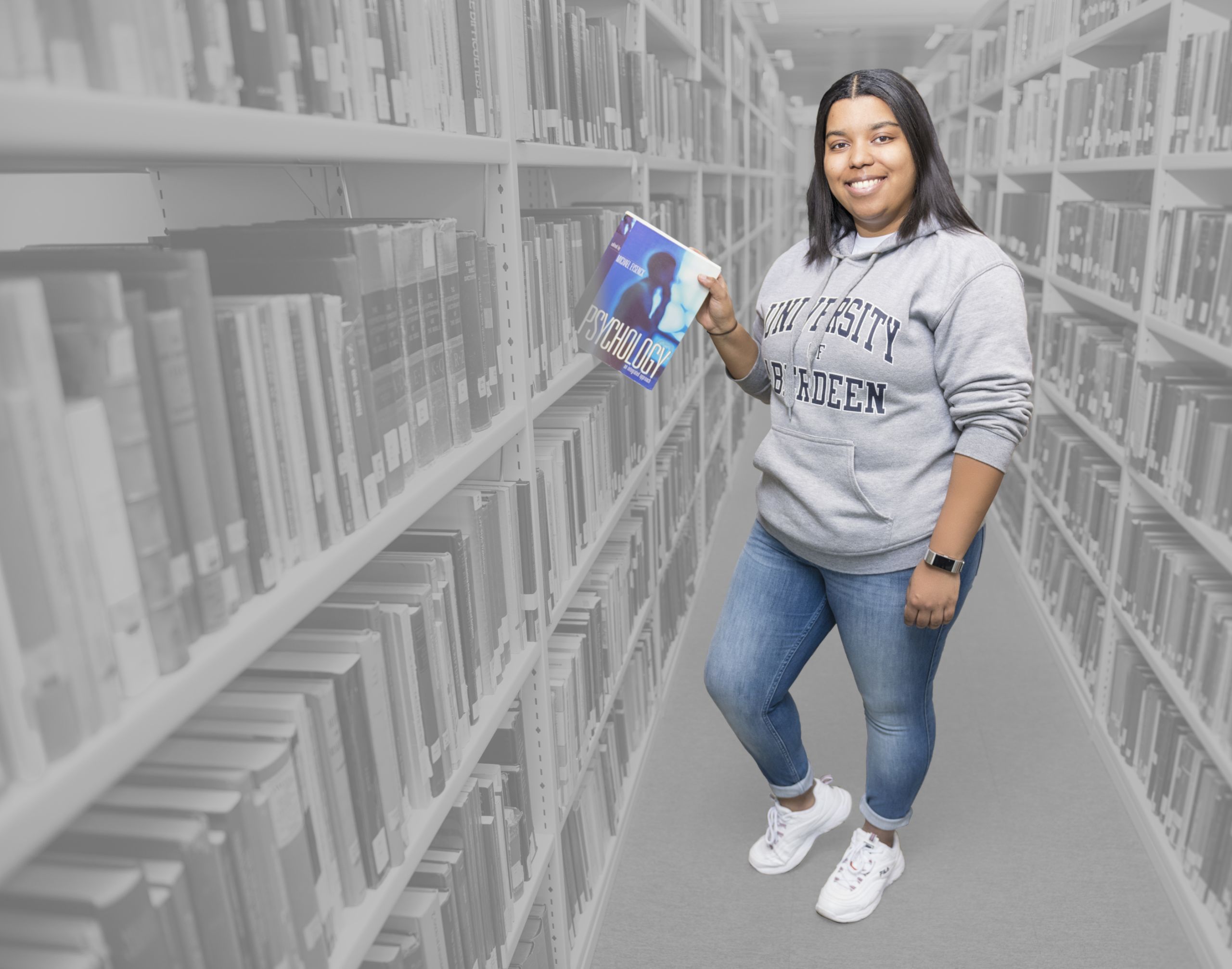 Photo of Marta Lopes with a black and white background.