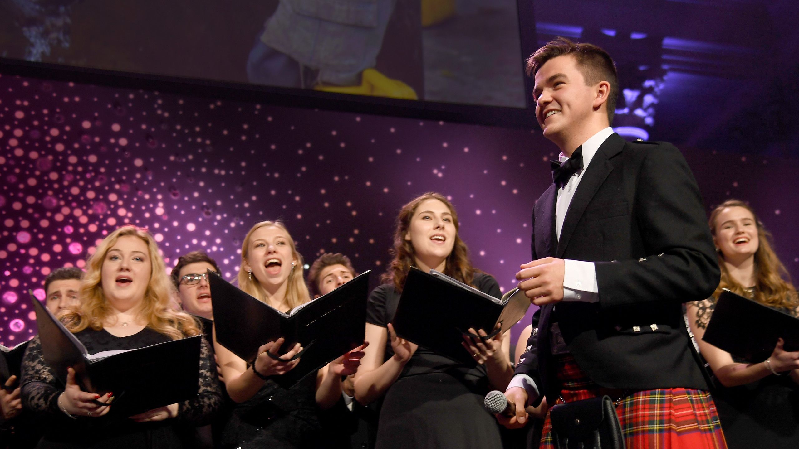 Photo of the Chapel Choir on stage at the UNICEF Snowflake Ball, New York, November 2018.