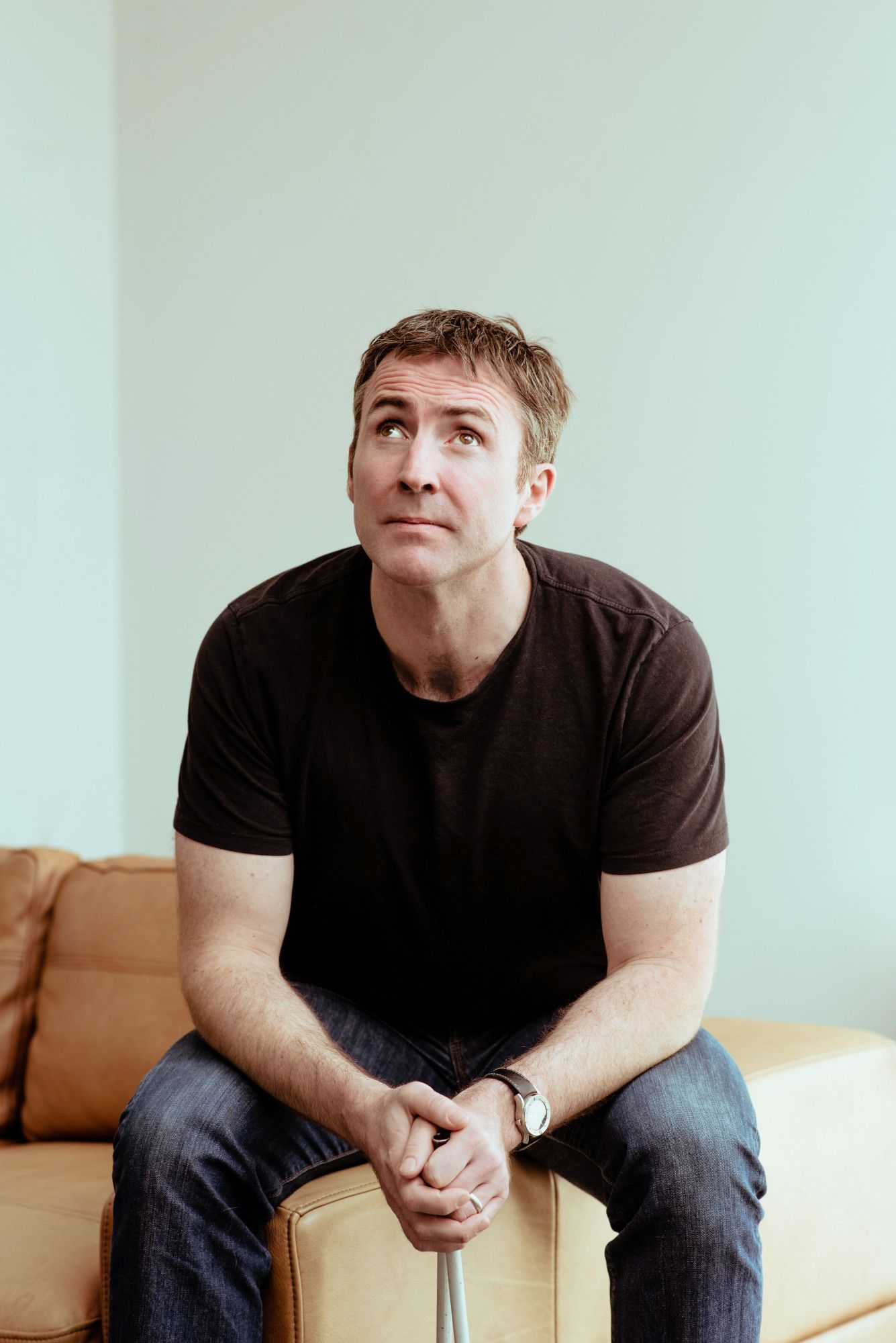 Portrait photo of Jamie MacDonald on a light background.