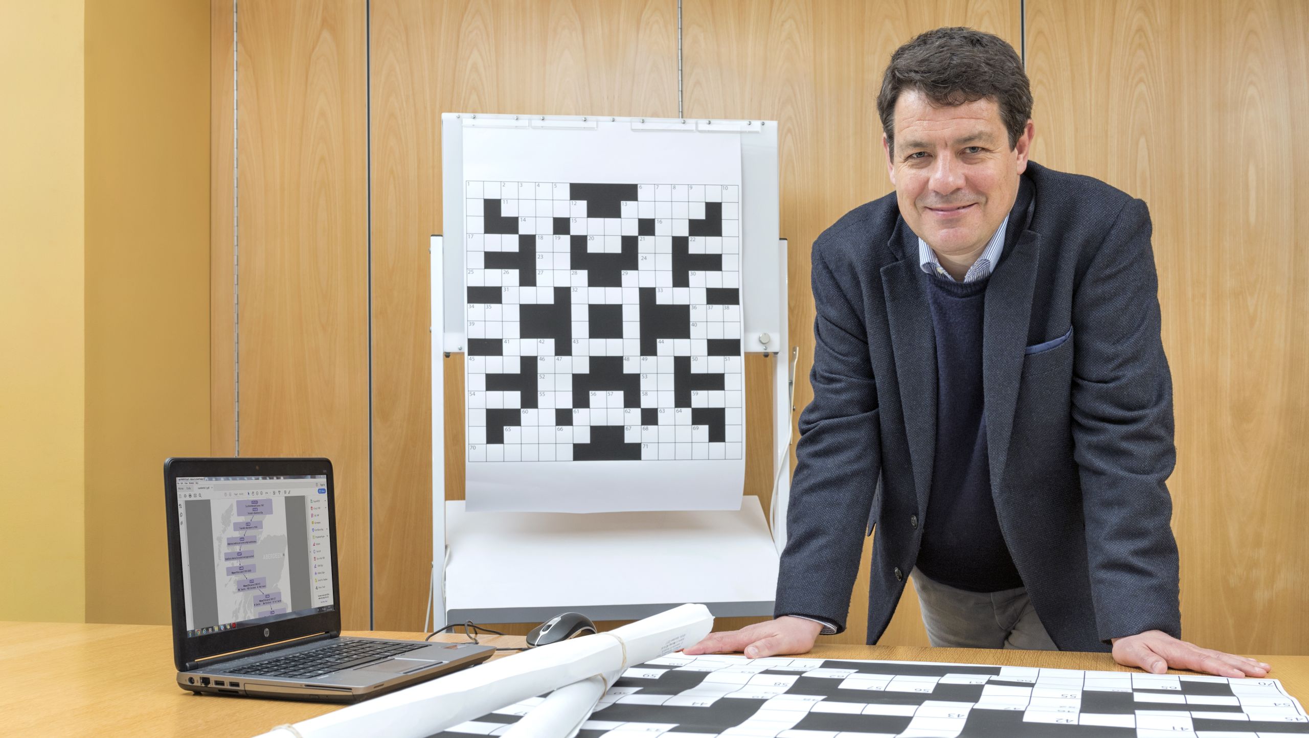 Photo of Dr. Roger Staff with research equipment.